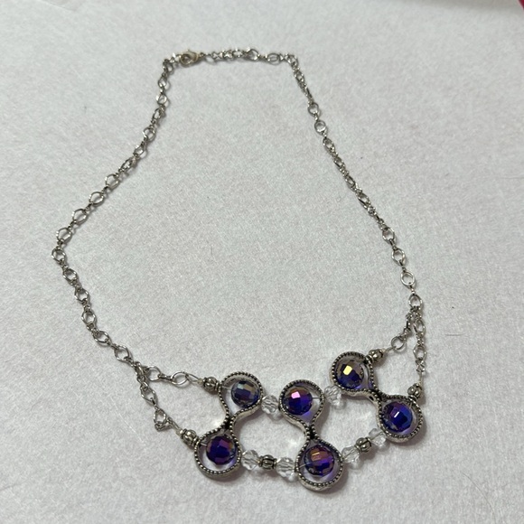 Silver colored chain with 6 purple reflective beads. - Picture 3 of 3